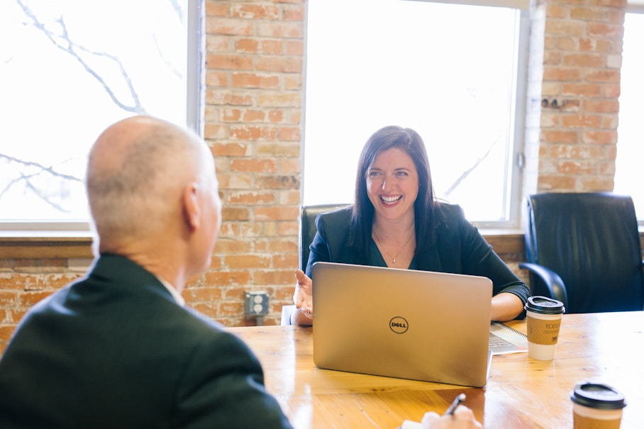 Attorney reviewing naturalization documents with client